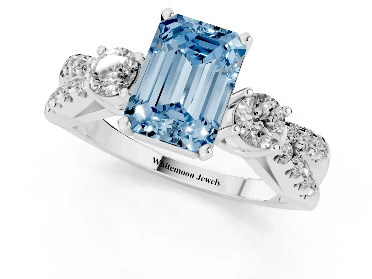 Fancy Blue Emerald Cut Diamond Three-Stone Ring with Pavé Split Shank and Four-Prong Setting Silver