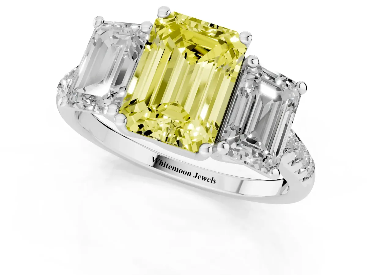 Fancy Yellow Three-Stone Emerald Cut Diamond Ring with Round Pavé Band and Prong Setting Silver