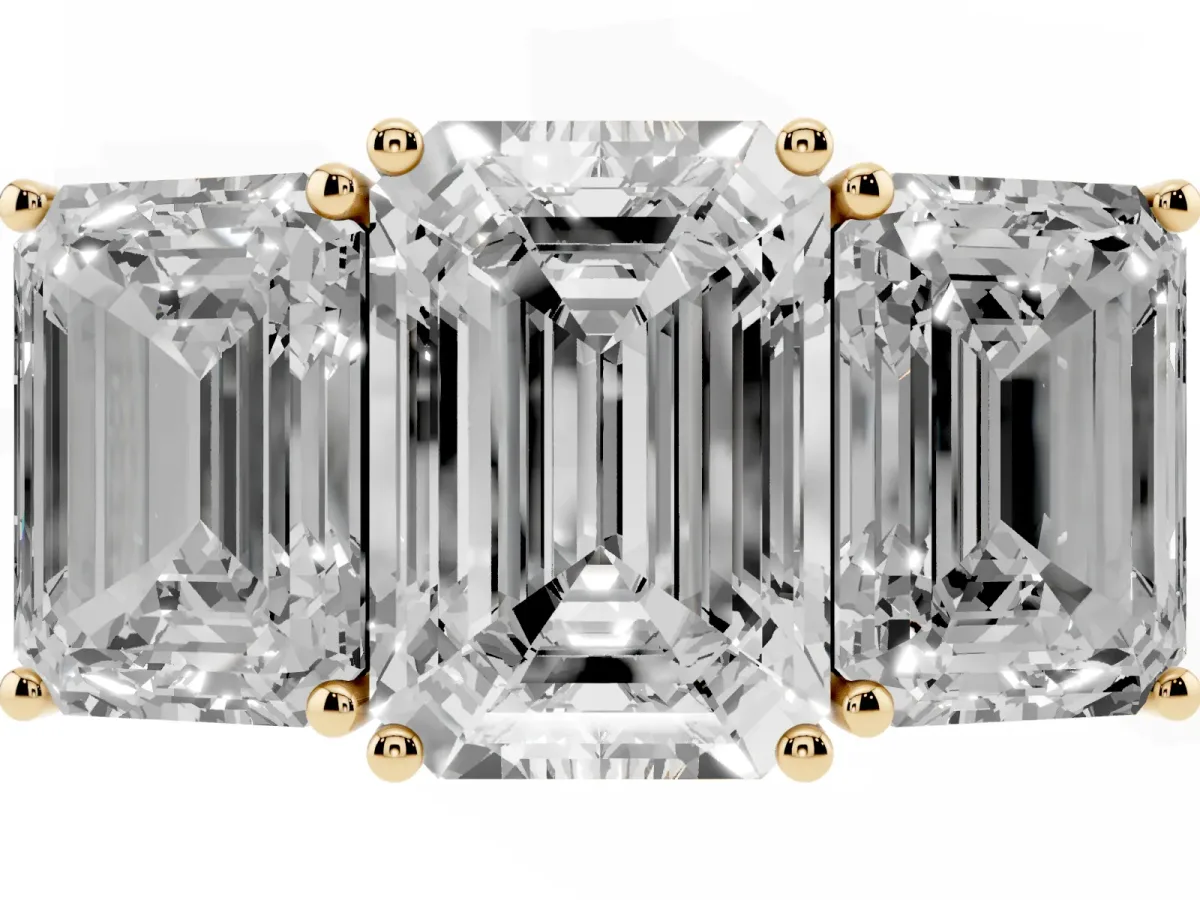 Emerald Cut Diamond Three-Stone Ring with Prong Setting and Textured Band Yellow gold