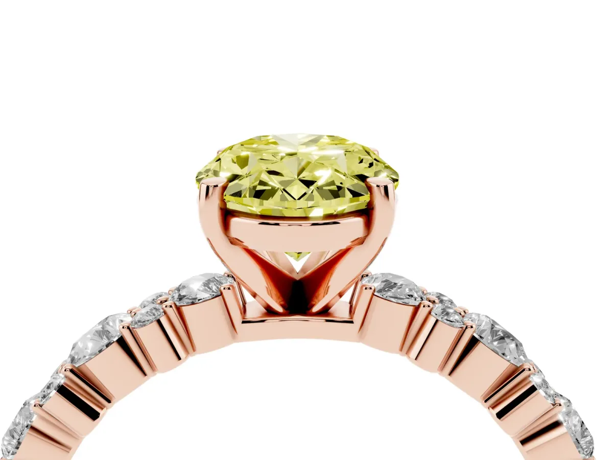 Fancy Yellow Oval Cut Diamond Side Stone Solitaire Ring with Round and Four-Prong Setting Rose gold