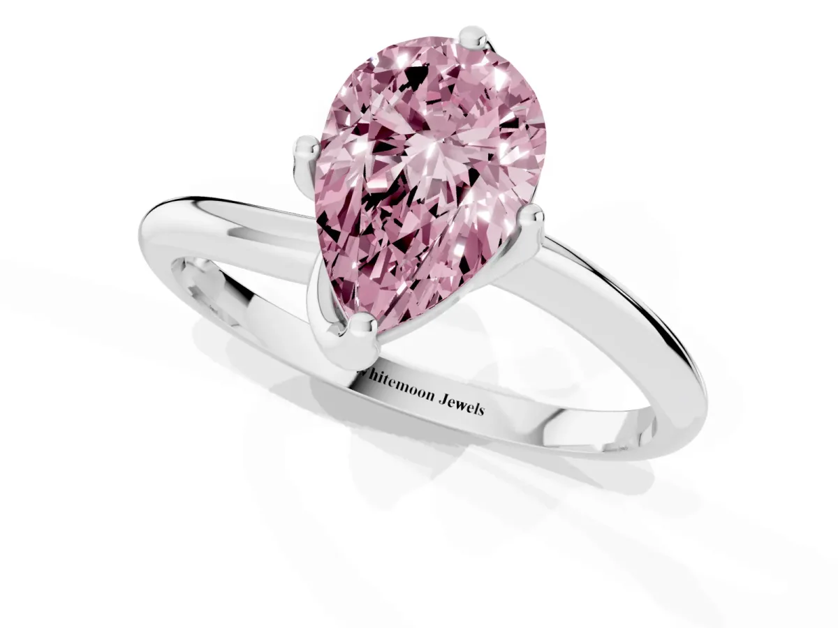 Fancy Pink Pear Cut Diamond Solitaire Engagement Ring with Four-Prong Setting and Classic Band Silver