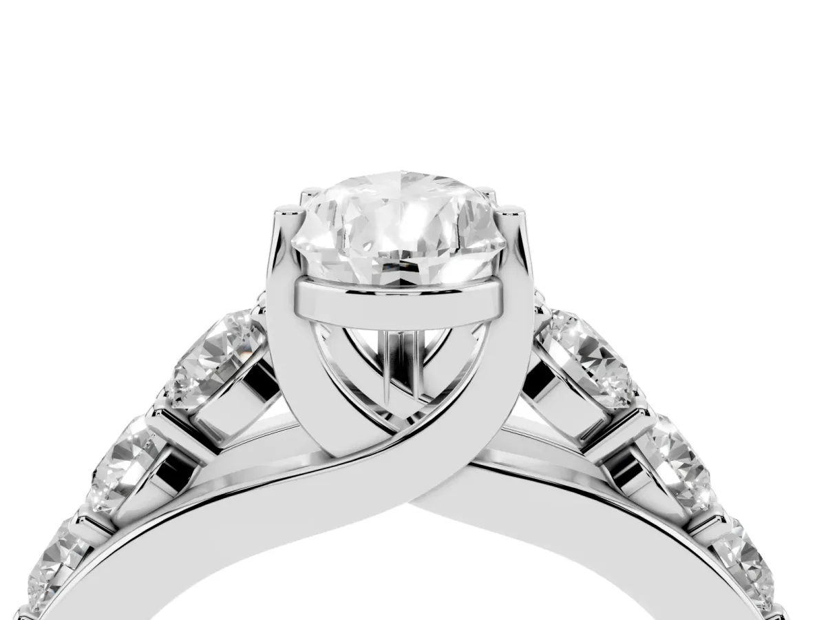 Pear Cut Diamond Engagement Ring with Pavé Band and Four-Prong Setting Platinum
