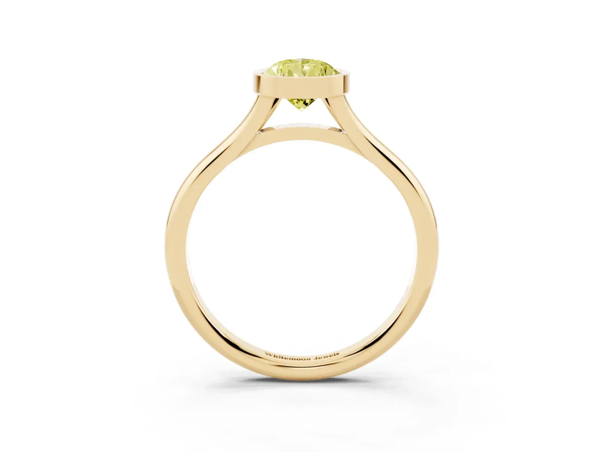 Fancy Yellow Bezel Set Pear Cut Cut Solitaire Ring with Tapered Band Yellow gold