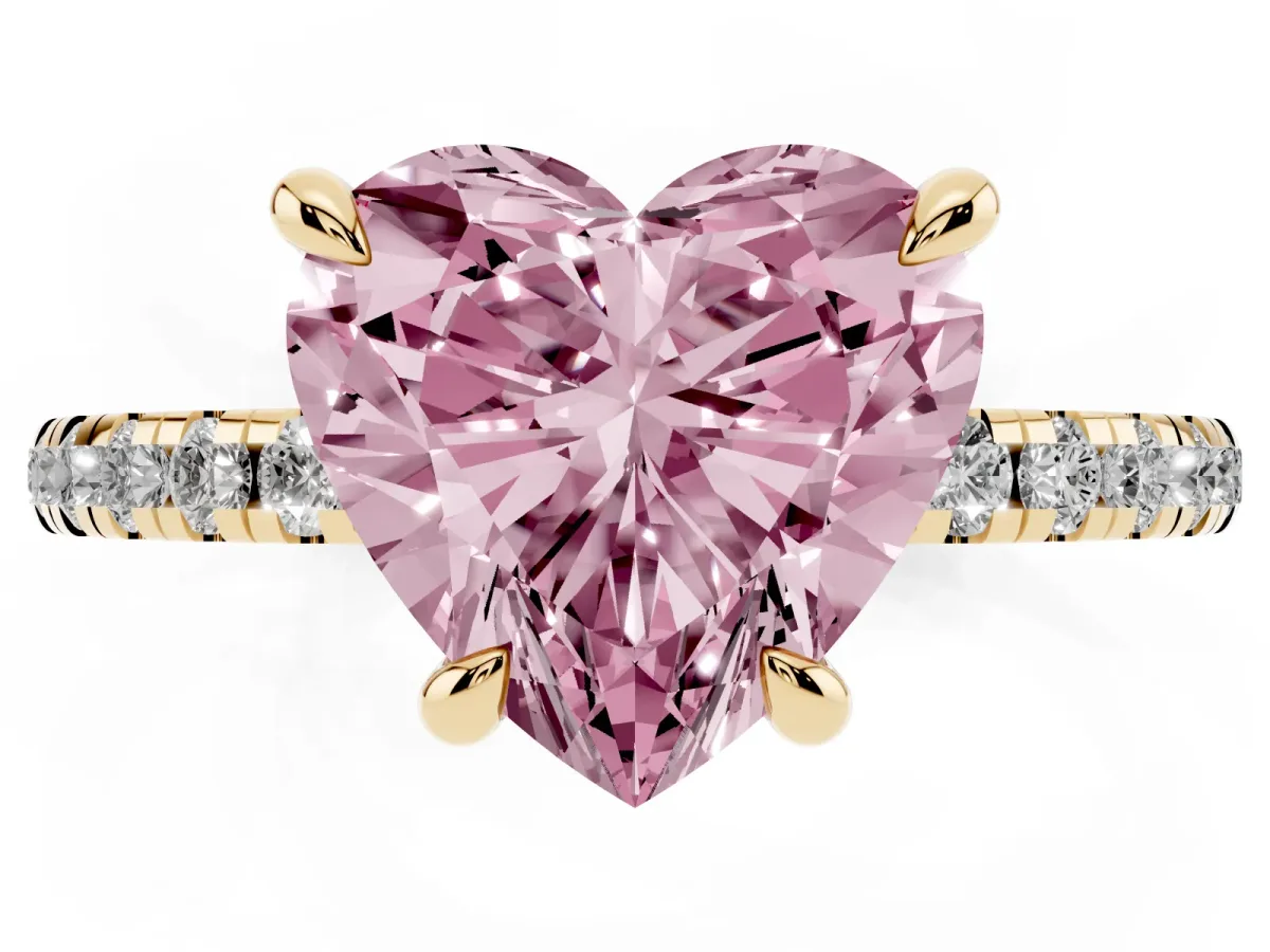 Fancy Pink Heart Cut Diamond Brilliant Solitaire Ring with Pavé Band and Four-Prong Setting Yellow gold