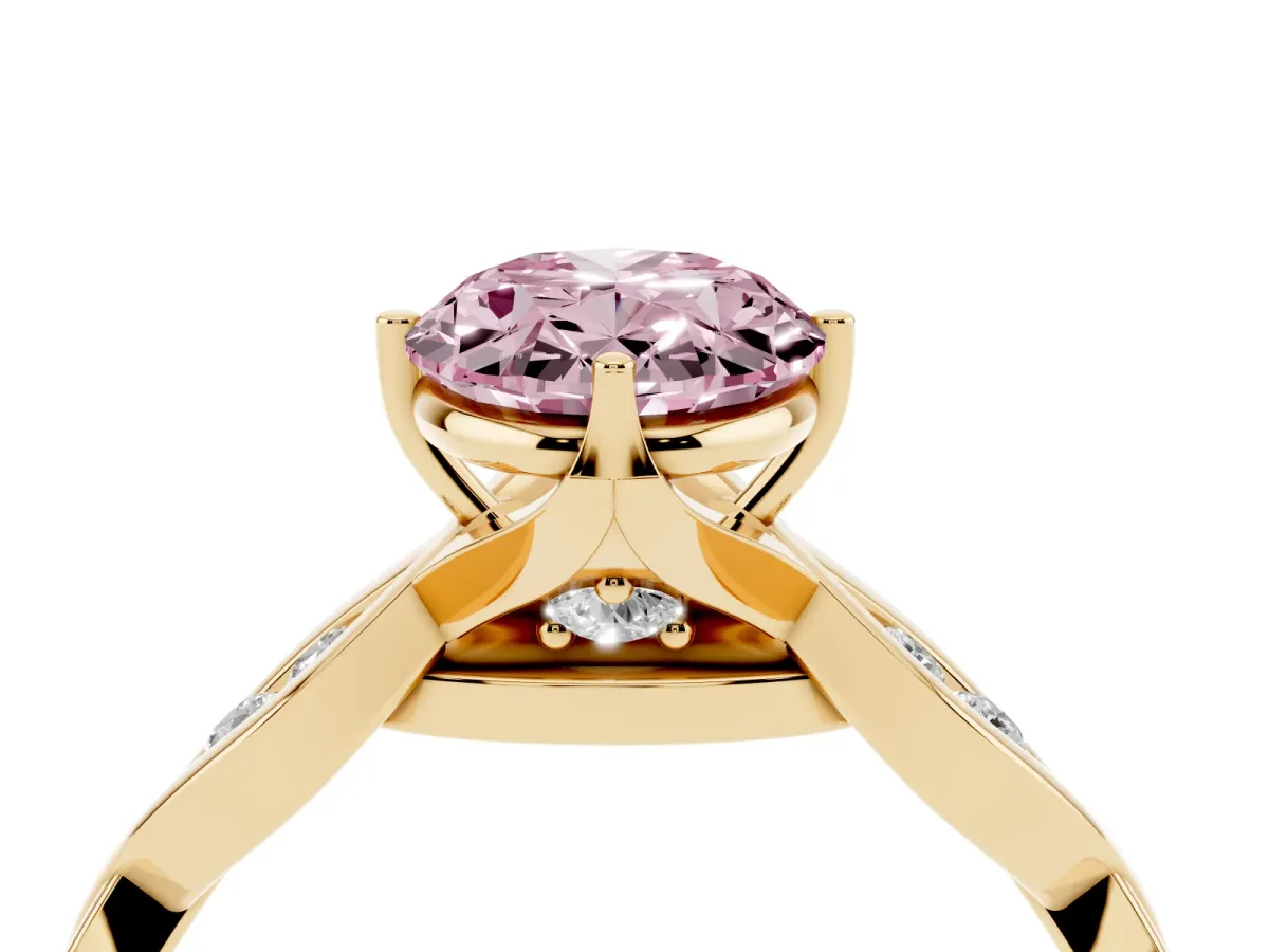 Fancy Pink Oval Cut Solitaire Twist Band with Leaf Prong Setting Yellow gold