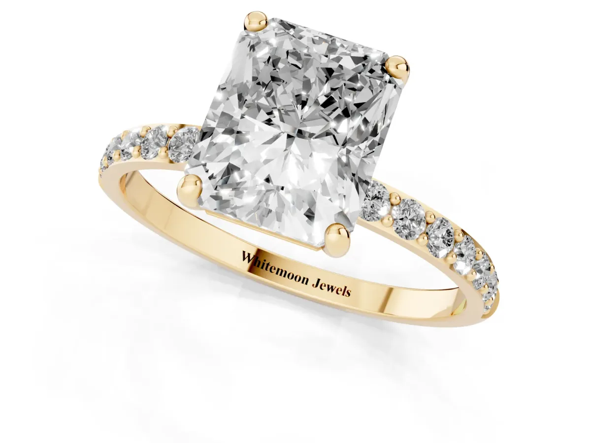 Radiant Cut Diamond Solitaire Ring with Round Pavé Band and Prong Setting Yellow gold