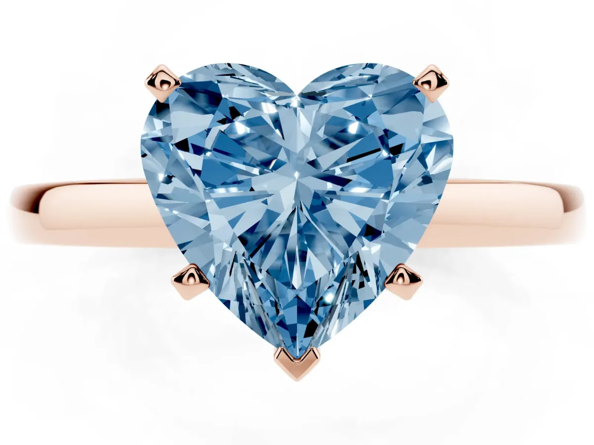 Fancy Blue Heart Cut Solitaire Diamond Engagement Ring with Four-Prong Setting on a Classic Band Rose gold