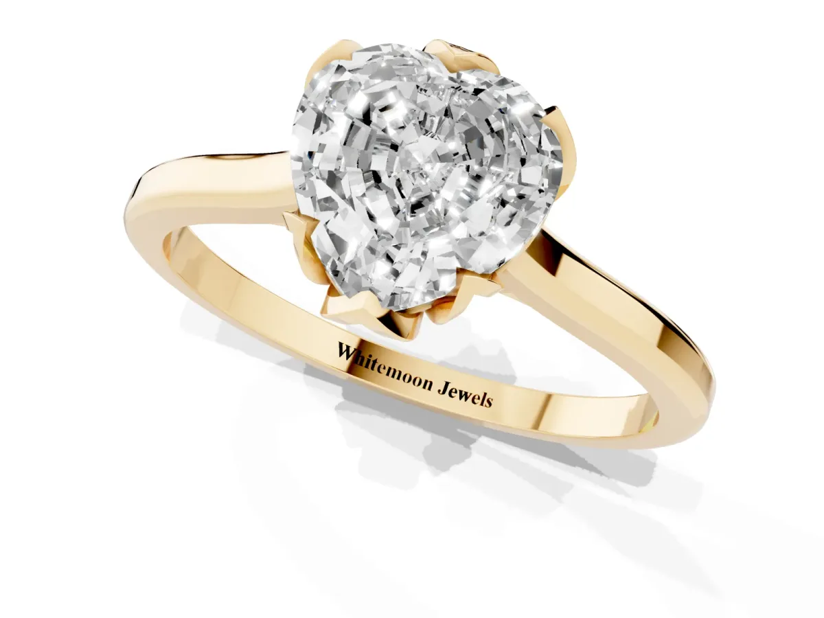 Heart Cut Diamond Solitaire Ring with Flower Prong Setting and Classic Band Yellow gold