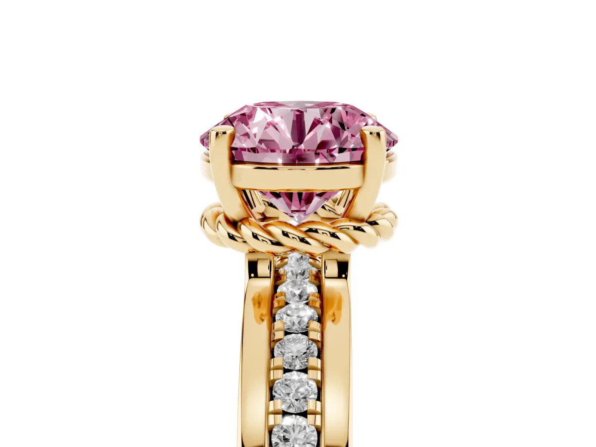 Fancy Pink Round Cut Solitaire Diamond Ring with Channel Set Band and Six-Prong Setting Yellow gold