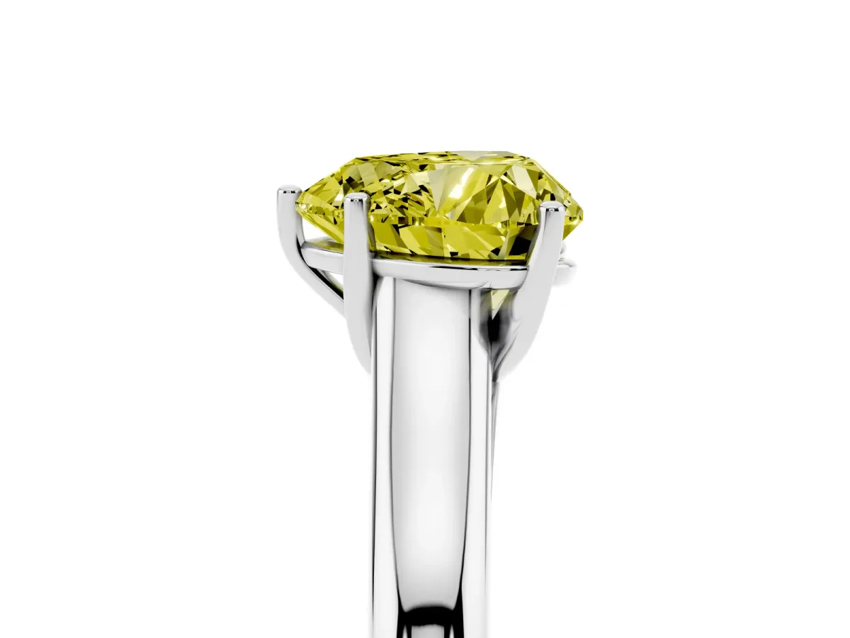 Fancy Yellow Heart Cut Cut Diamond Solitaire Engagement Ring with Tapered Plain Band and Four-Prong Setting Platinum