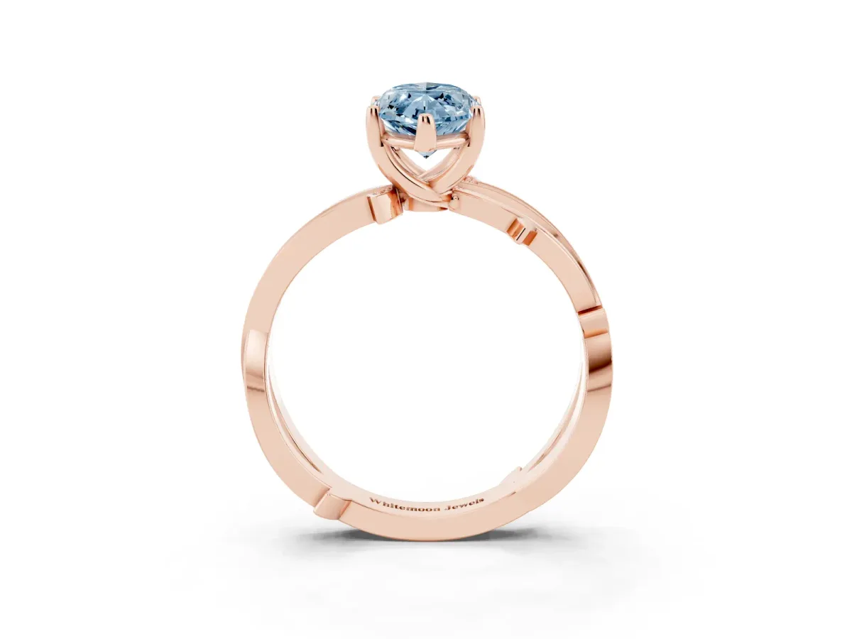 Fancy Blue Marquise Cut Solitaire Twist Band with Pavé Accents and Four-Prong Setting Rose gold