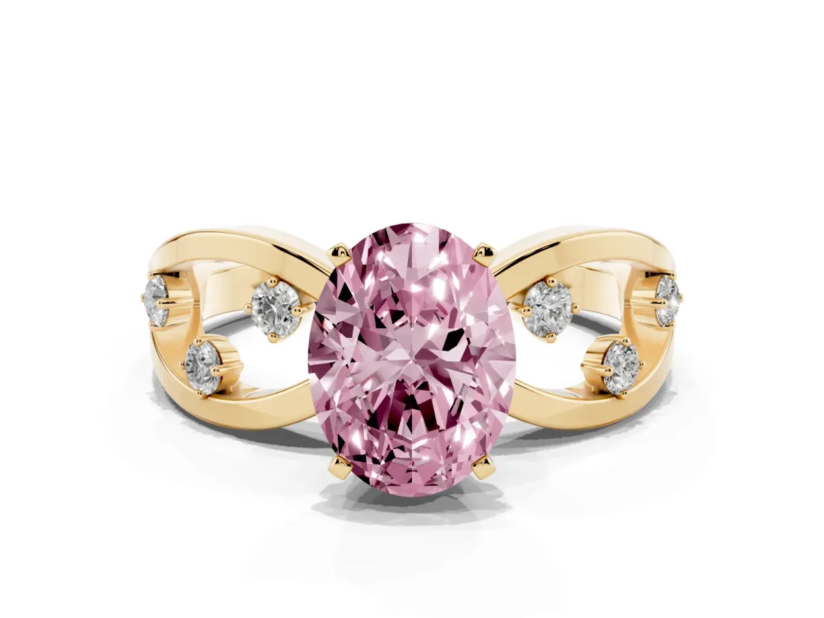 Fancy Pink Oval Cut Cut Solitaire Diamond with Side Stones on Criss-Cross Band and Four-Prong Setting Yellow gold