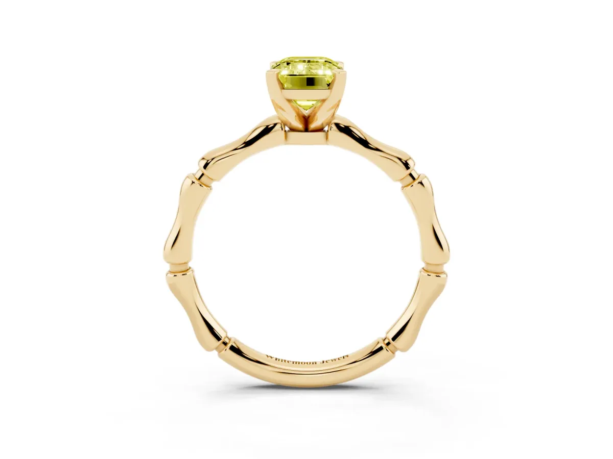 Fancy Yellow Emerald Cut Solitaire Diamond Ring with Bamboo Band and Four-Prong Setting Yellow gold