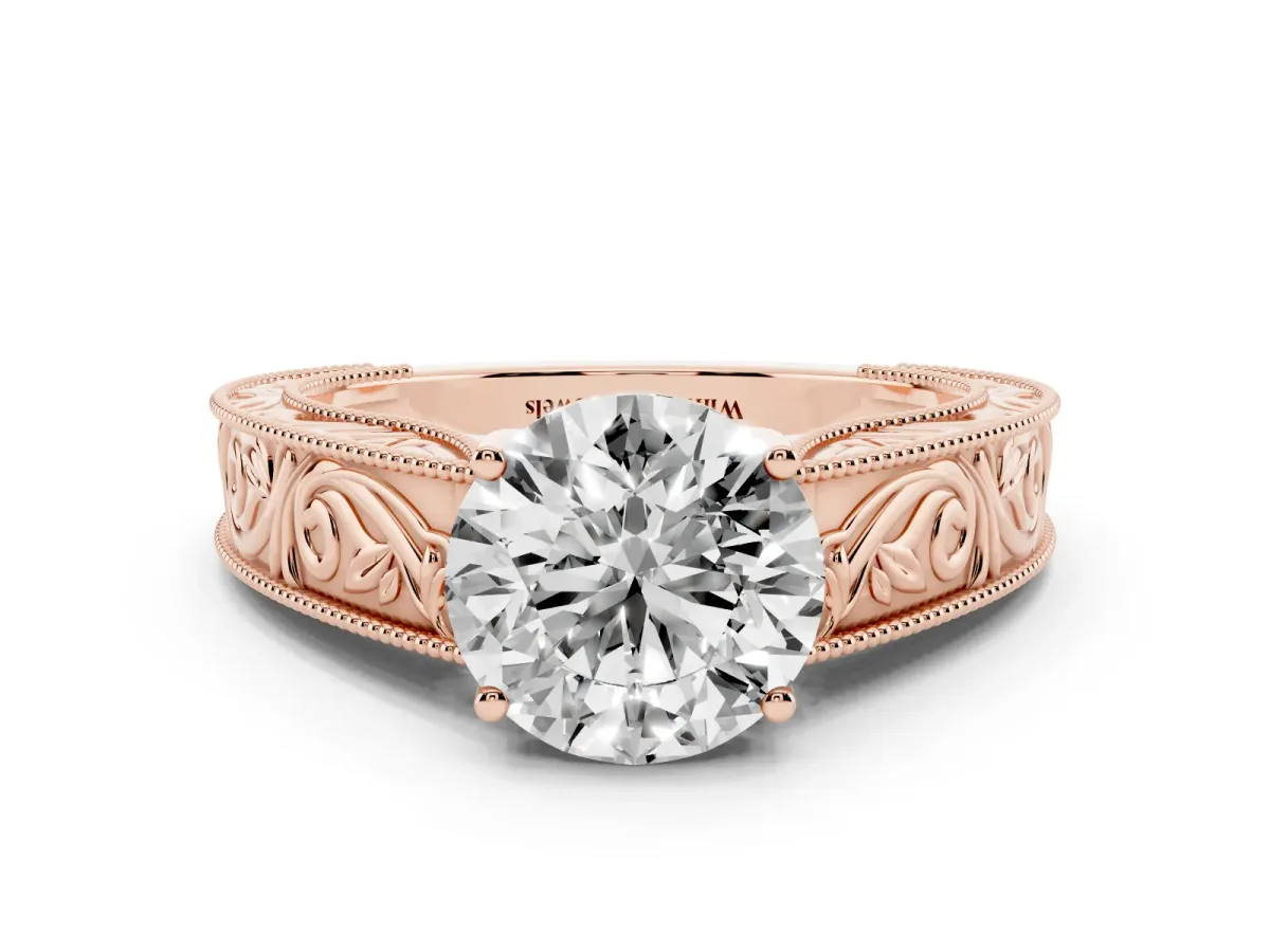 Round Cut Diamond Solitaire Ring with Engraved Band and Four-Prong Setting Rose gold