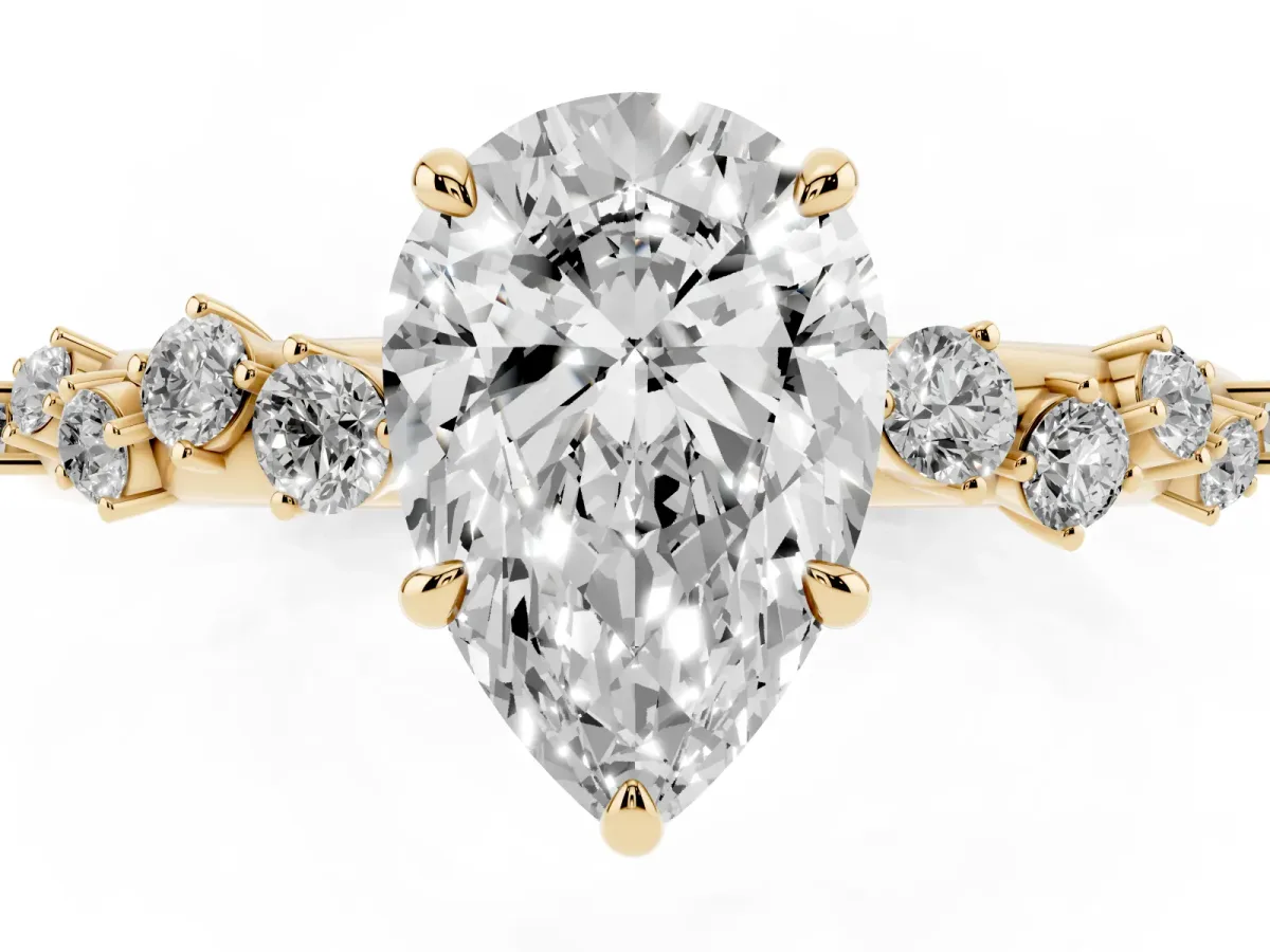Pear Cut Diamond Cluster Prong-Set Solitaire Ring Yellow gold