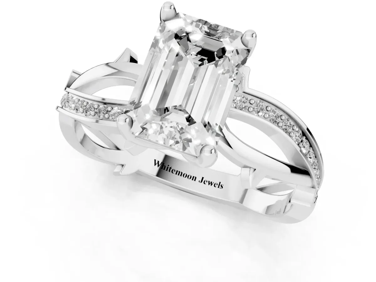 Emerald Cut Solitaire Twist Band with Pavé Accents and Four-Prong Setting Platinum