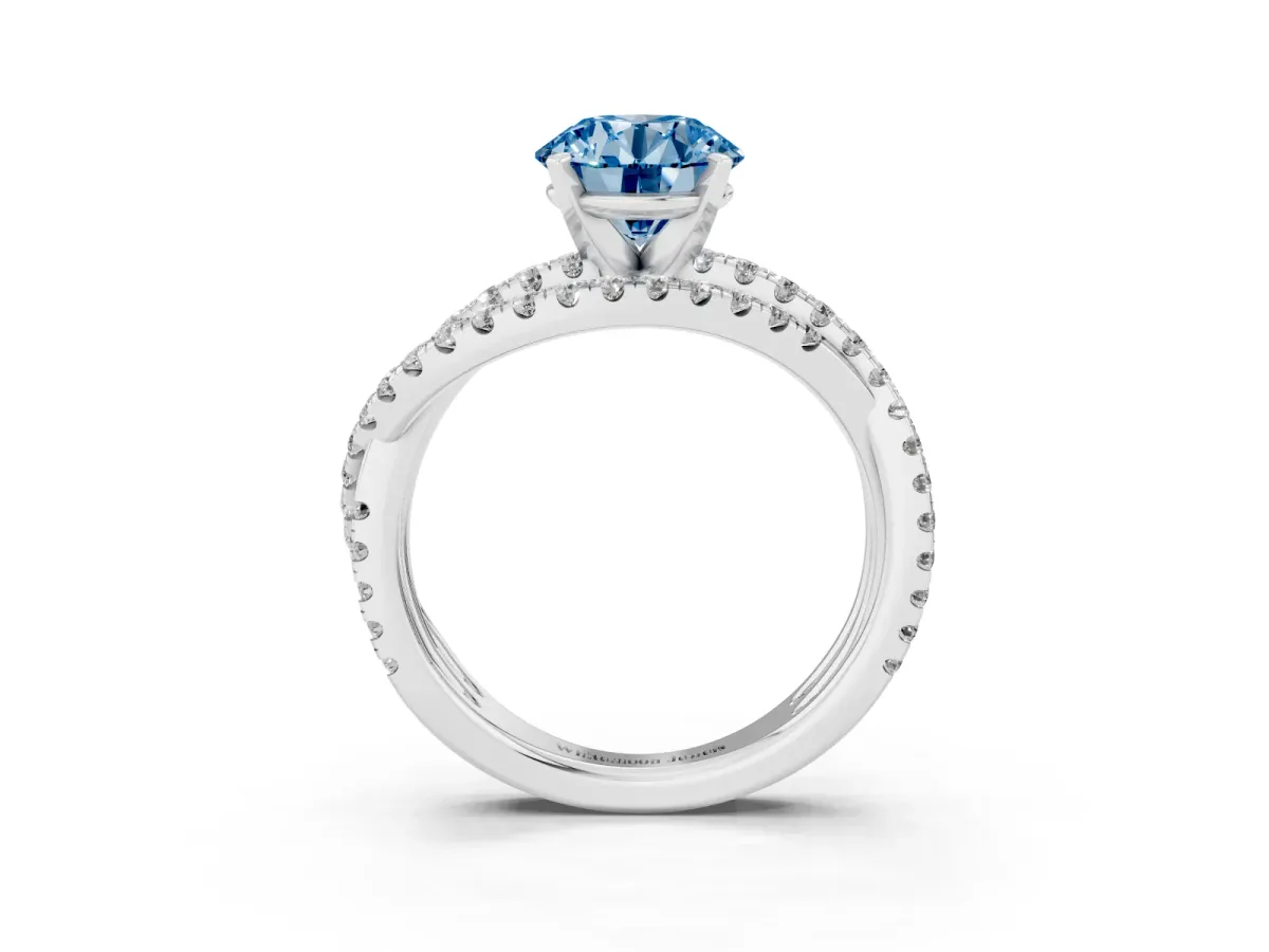 Fancy Blue Round Cut Solitaire Twist Band with Pavé Setting and Four-Prong Setting Silver