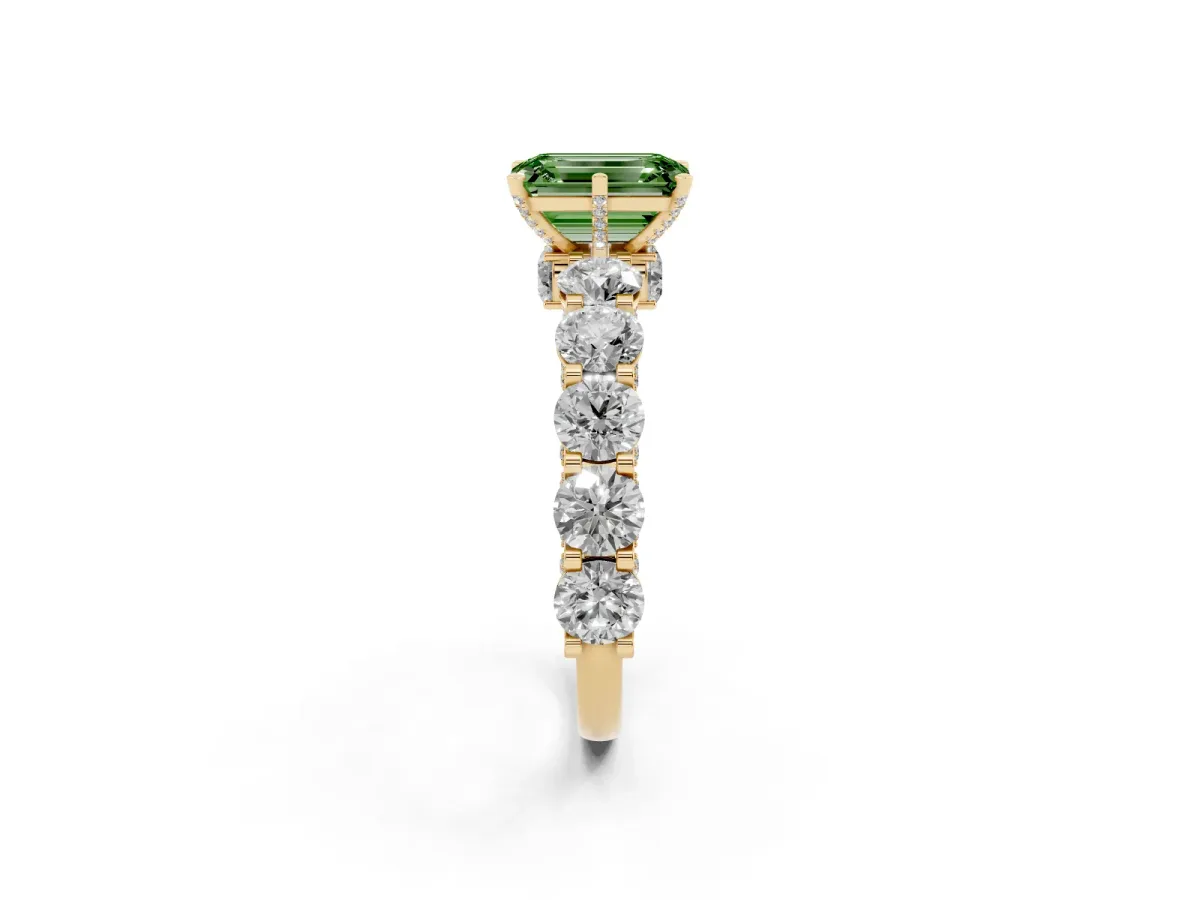Fancy Green Emerald Cut Diamond Side Stone Engagement Ring with Four-Prong Setting Yellow gold