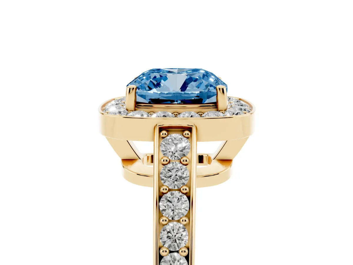 Fancy Blue Cushion Cut Halo Pavé Diamond Engagement Ring with Bezel Setting Yellow gold