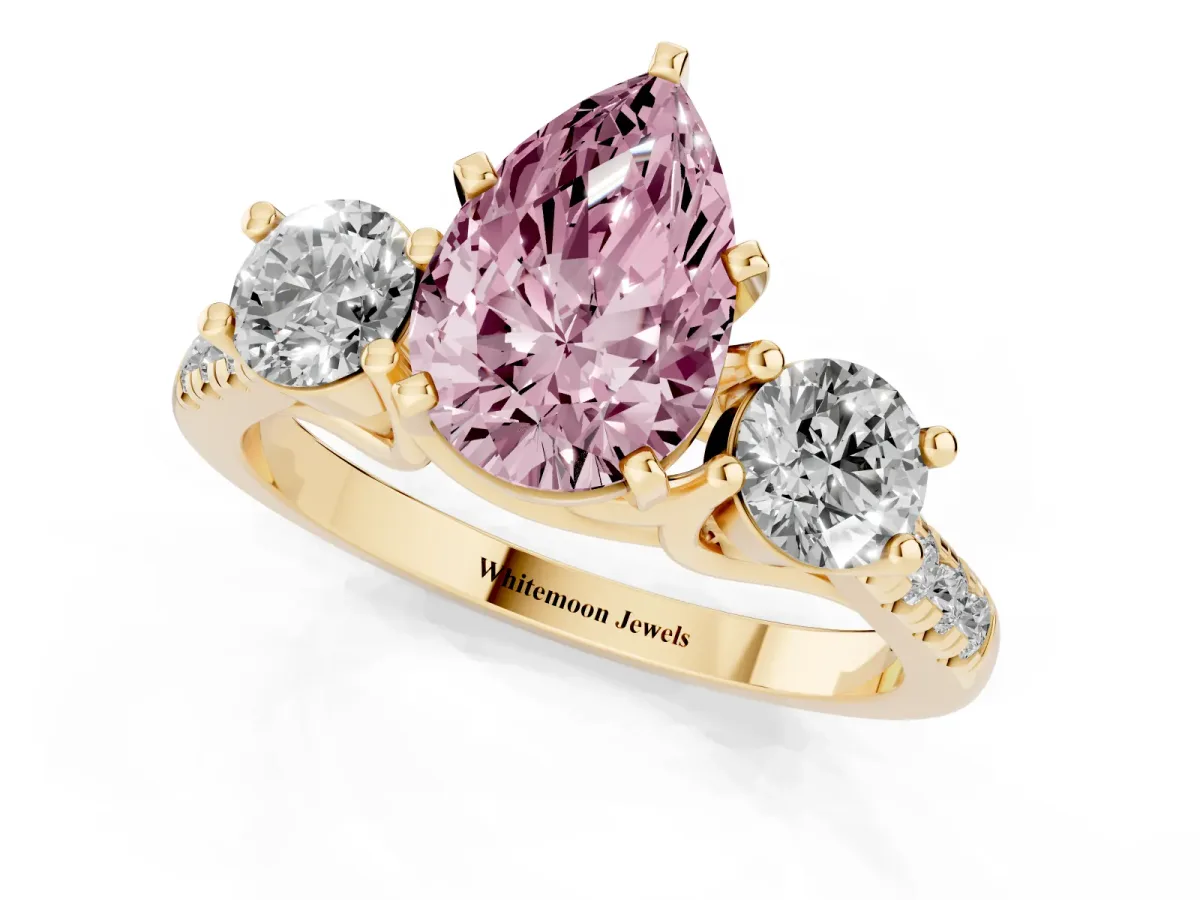 Fancy Pink Three-Stone Pear Cut Diamond Pavé Band with Four-Prong Setting Yellow gold