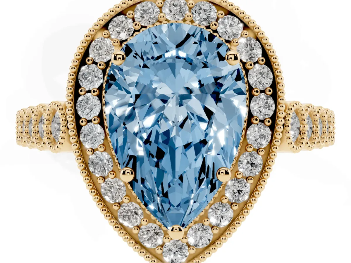 Fancy Blue Pear Cut Halo Milgrain Solitaire with Bezel Set Side Stones and Pave Band Yellow gold