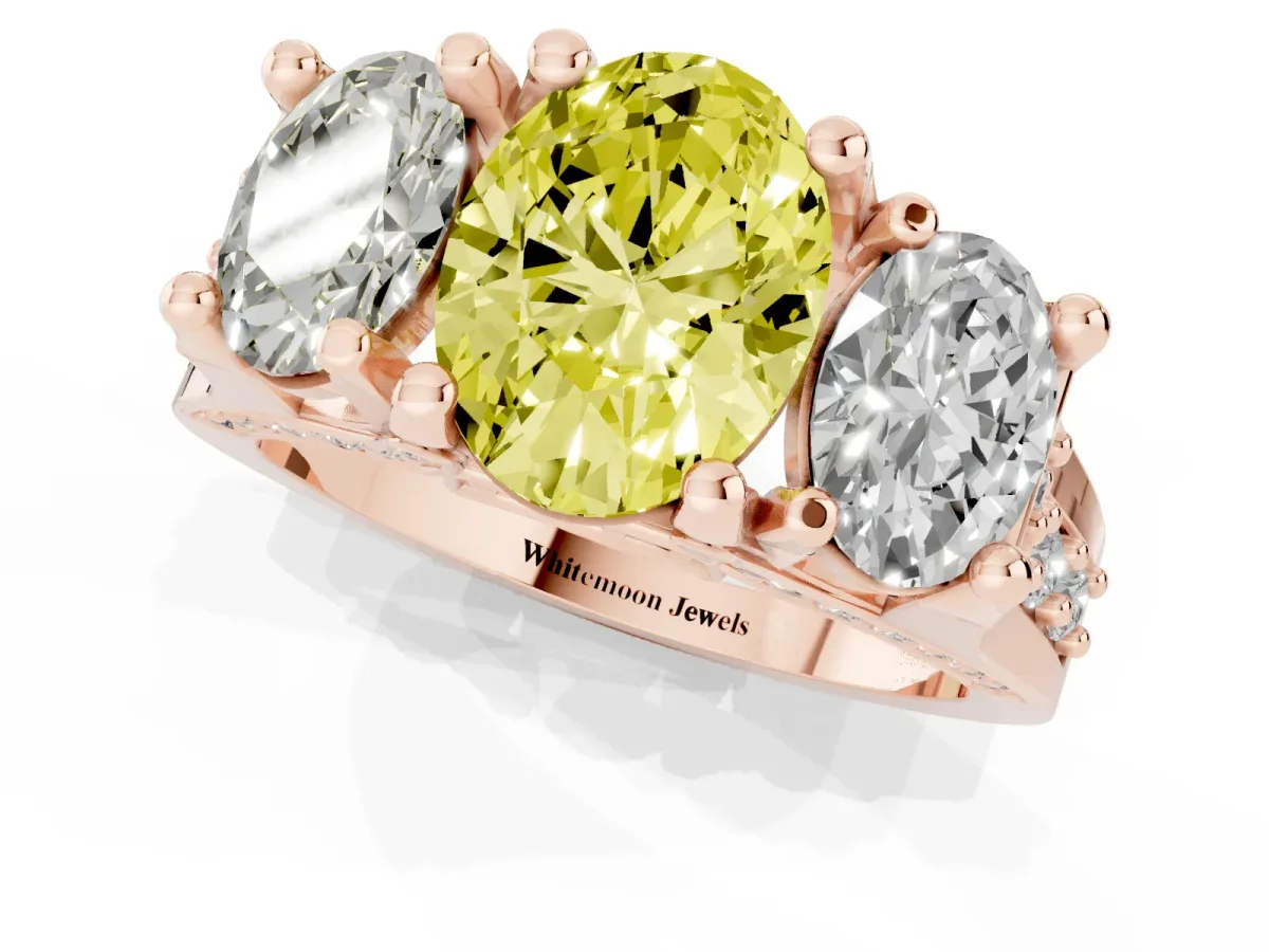 Fancy Yellow Oval Cut Diamond Three-Stone Ring with Channel Set Band and Four-Prong Setting Rose gold