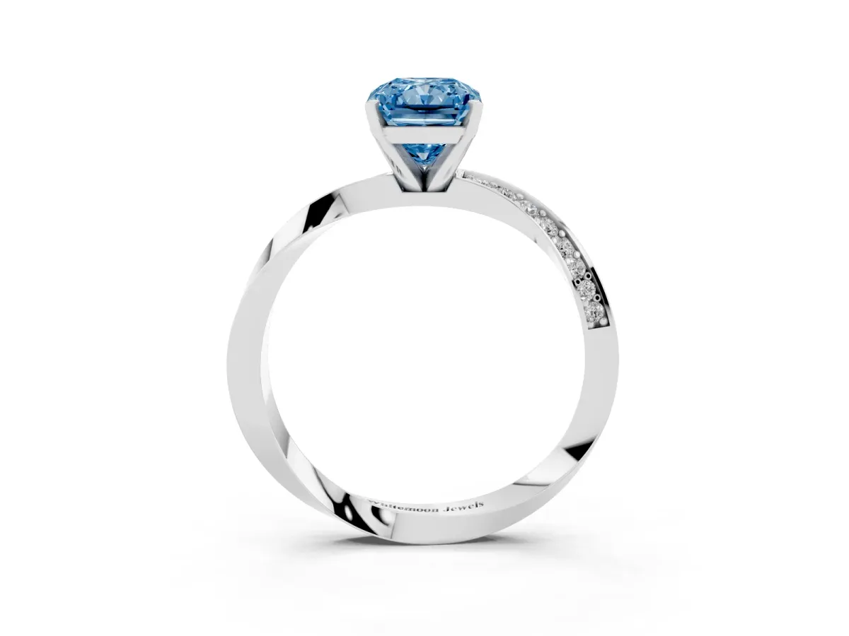 Fancy Blue Radiant Cut Diamond Engagement Ring with Side Stone Accents and Four-Prong Setting Platinum