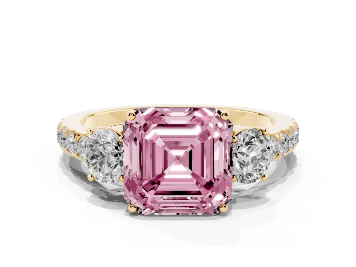 Fancy Pink Asscher Cut Cut Diamond Three-Stone Ring with Round Side Stones and Pavé Band Yellow gold