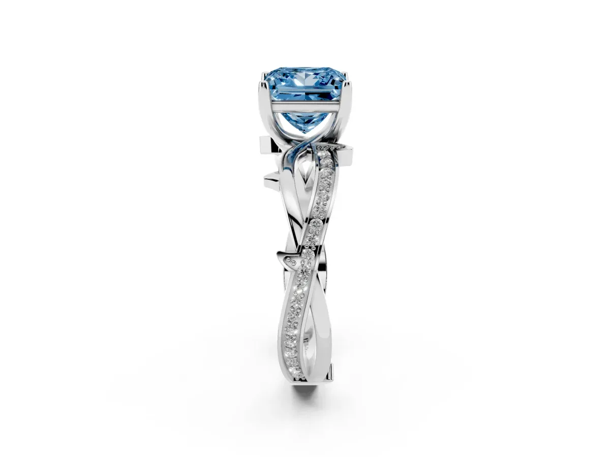 Fancy Blue Princess Cut Solitaire Twist Band with Pavé Accents and Four-Prong Setting Silver