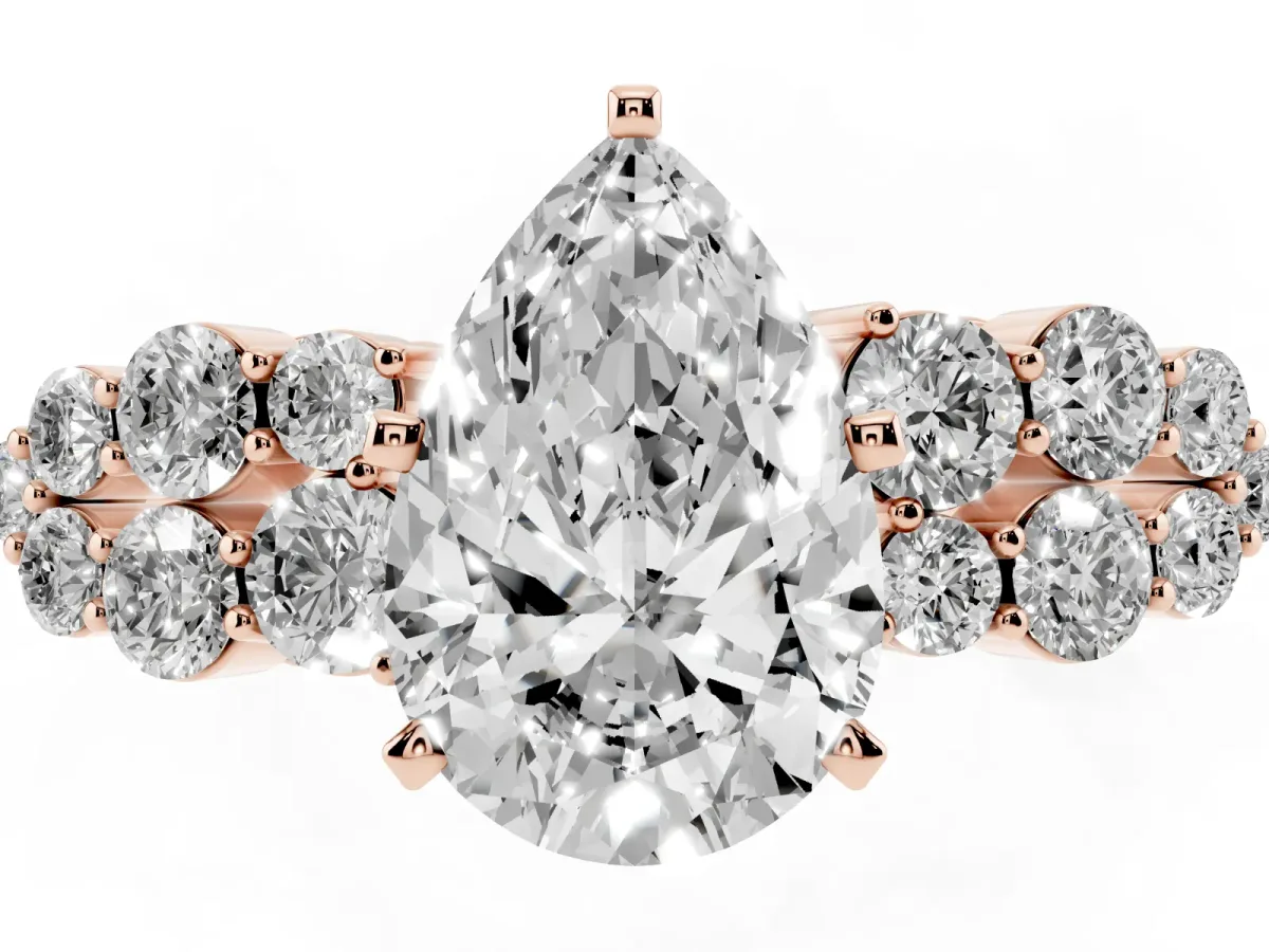 Pear Cut Cluster Diamond Engagement Ring with Pavé Band and Four-Prong Setting Rose gold