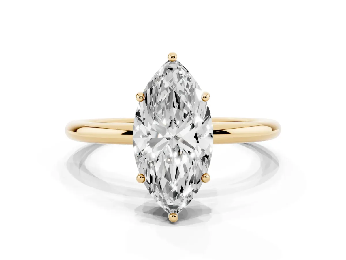 Marquise Cut Solitaire Diamond Ring with a Classic Band and Four-Prong Setting Yellow gold