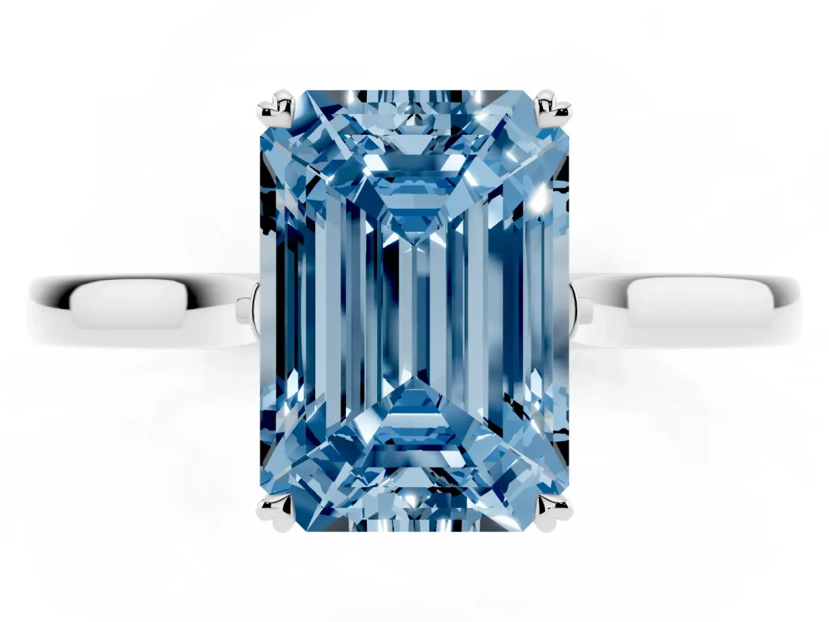Fancy Blue Emerald Cut Solitaire Heart Prong Engagement Ring with Tapered Band Silver