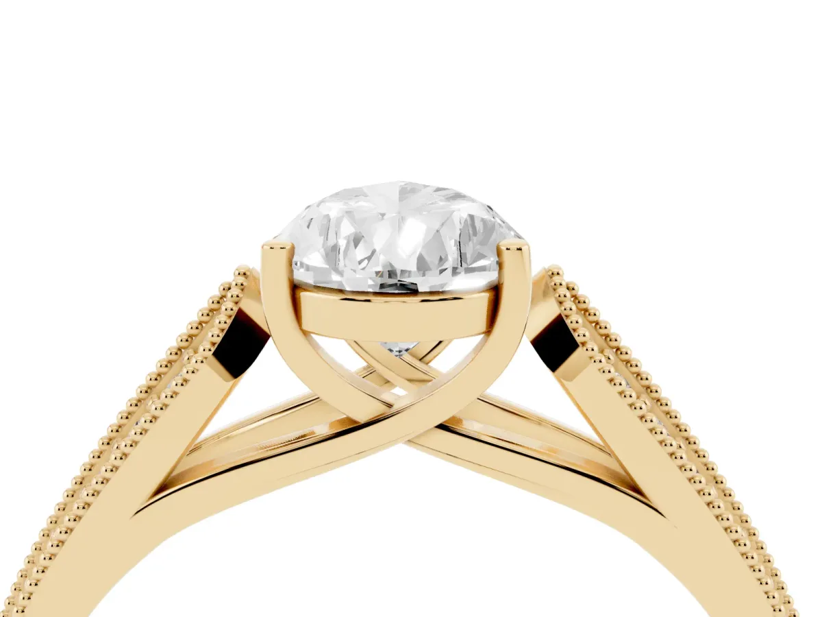 Pear Cut Cut Pave Split Shank Engagement Ring with Four-Prong Setting Yellow gold