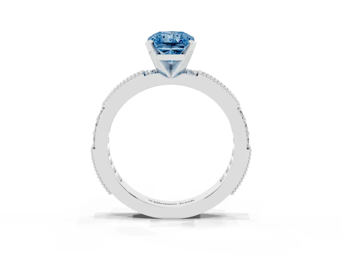 Fancy Blue Radiant Cut Solitaire with Pavé Band and Four-Prong Setting Silver