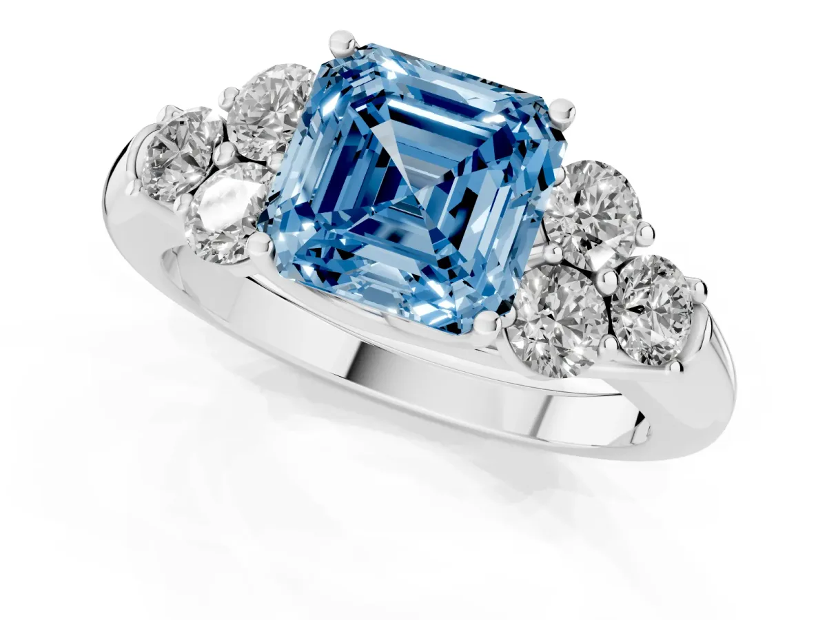 Fancy Blue Asscher Cut Cut Diamond Cluster Ring with Round Accent Stones and Prong Setting on a Classic Band White gold
