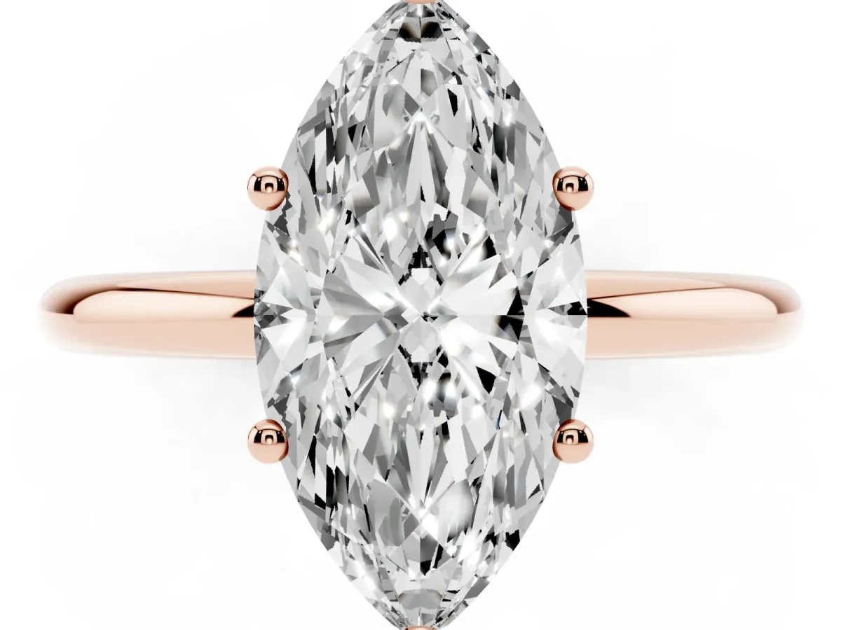 Marquise Cut Cut Solitaire Engagement Ring with Four-Prong Setting and Classic Band Rose gold