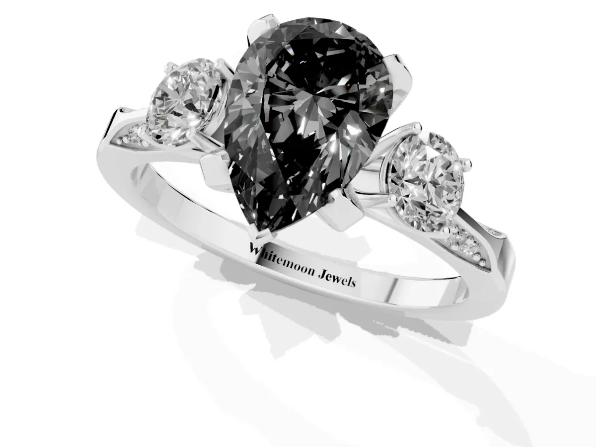 Fancy Black Pear Cut Brilliant Three-Stone Diamond Ring with Pavé Band and Four-Prong Setting Platinum