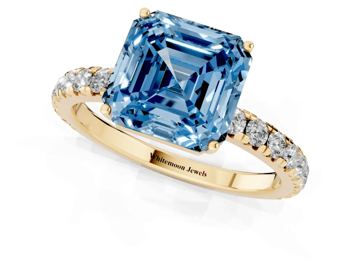 Fancy Blue Asscher Cut Diamond Pavé Solitaire Engagement Ring with Four-Prong Setting Yellow gold