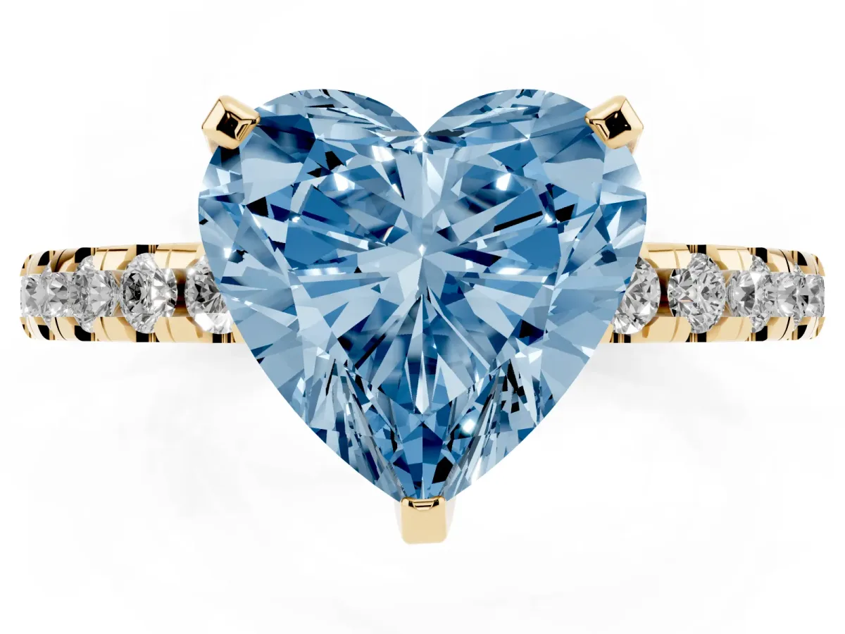 Fancy Blue Heart Cut Diamond Solitaire Ring with Round Pavé Band and Four-Prong Setting Yellow gold
