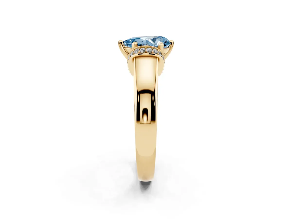 Fancy Blue Pear Cut Solitaire Diamond Ring with Pave Band and Six-Prong Setting Yellow gold
