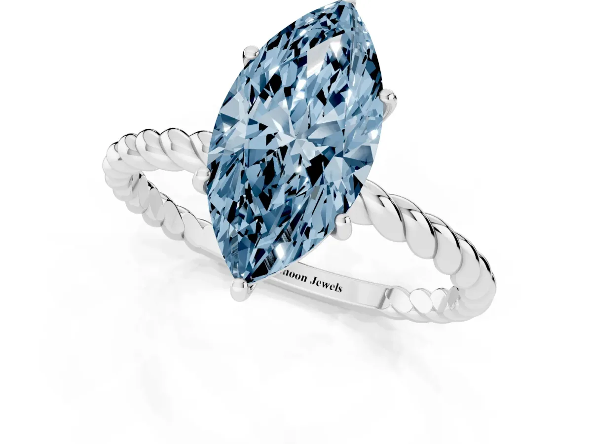 Fancy Blue Marquise Cut Solitaire Twist Band Ring with Four-Prong Setting Silver