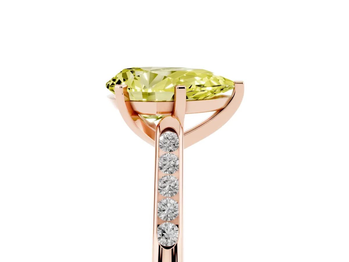 Fancy Yellow Pear Cut Diamond Solitaire Ring with Channel Set Round Band and Prong Setting Rose gold