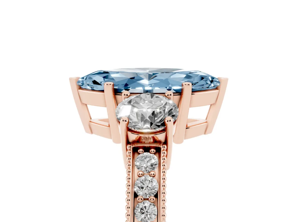 Fancy Blue Marquise Cut Three-Stone Diamond Ring with Pavé Band and Four-Prong Setting Rose gold