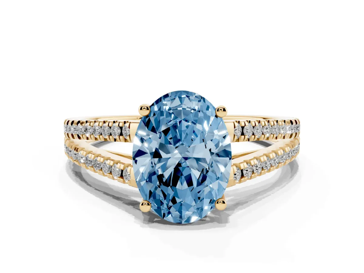 Fancy Blue Oval Cut Diamond Solitaire Engagement Ring with Split Shank Pavé Band Yellow gold