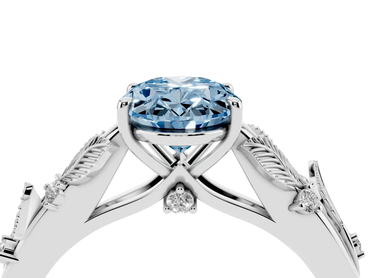 Fancy Blue Oval Cut Diamond Solitaire Ring with Leaf Motif Band and Four-Prong Setting Silver