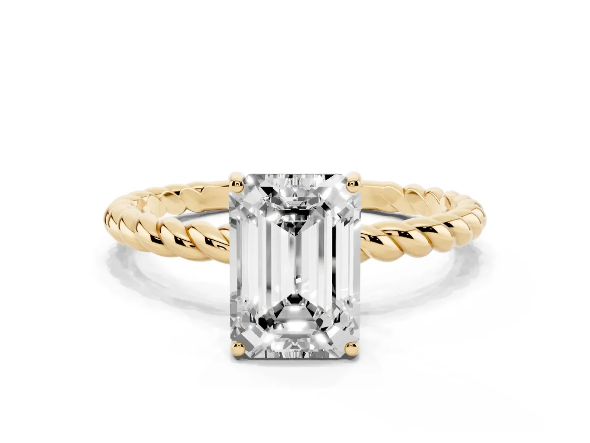 Emerald Cut Solitaire Twist Band Ring with Four-Prong Setting Yellow gold