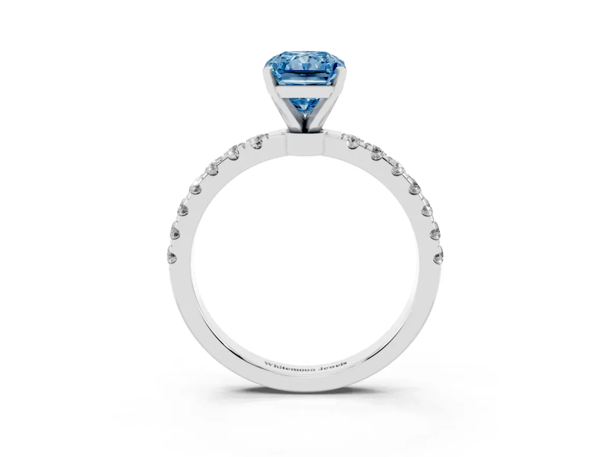 Fancy Blue Radiant Cut Diamond Solitaire Ring with Pavé Accents and Four-Prong Setting Silver