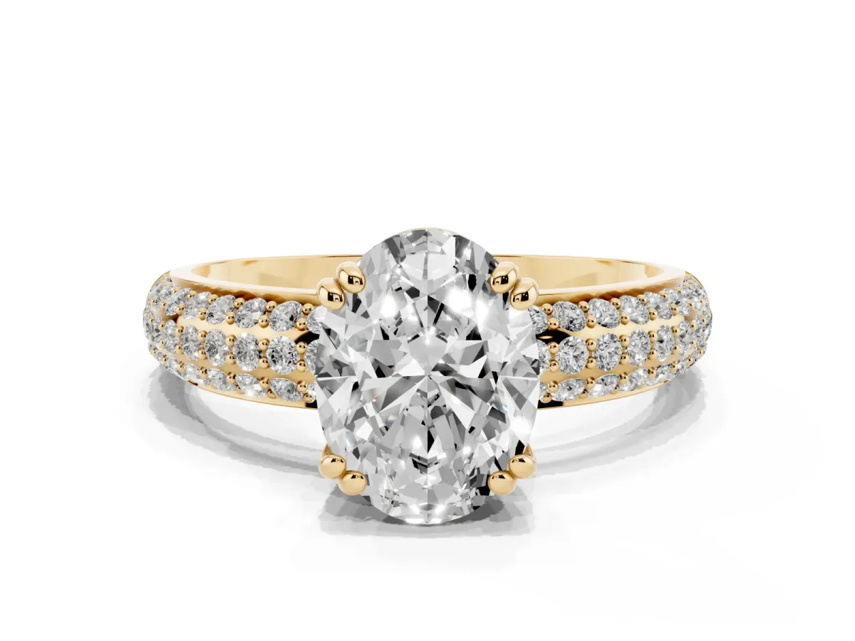 Oval Cut Diamond Solitaire Ring with Multi-Row Round Pavé Band and Prong Setting Yellow gold