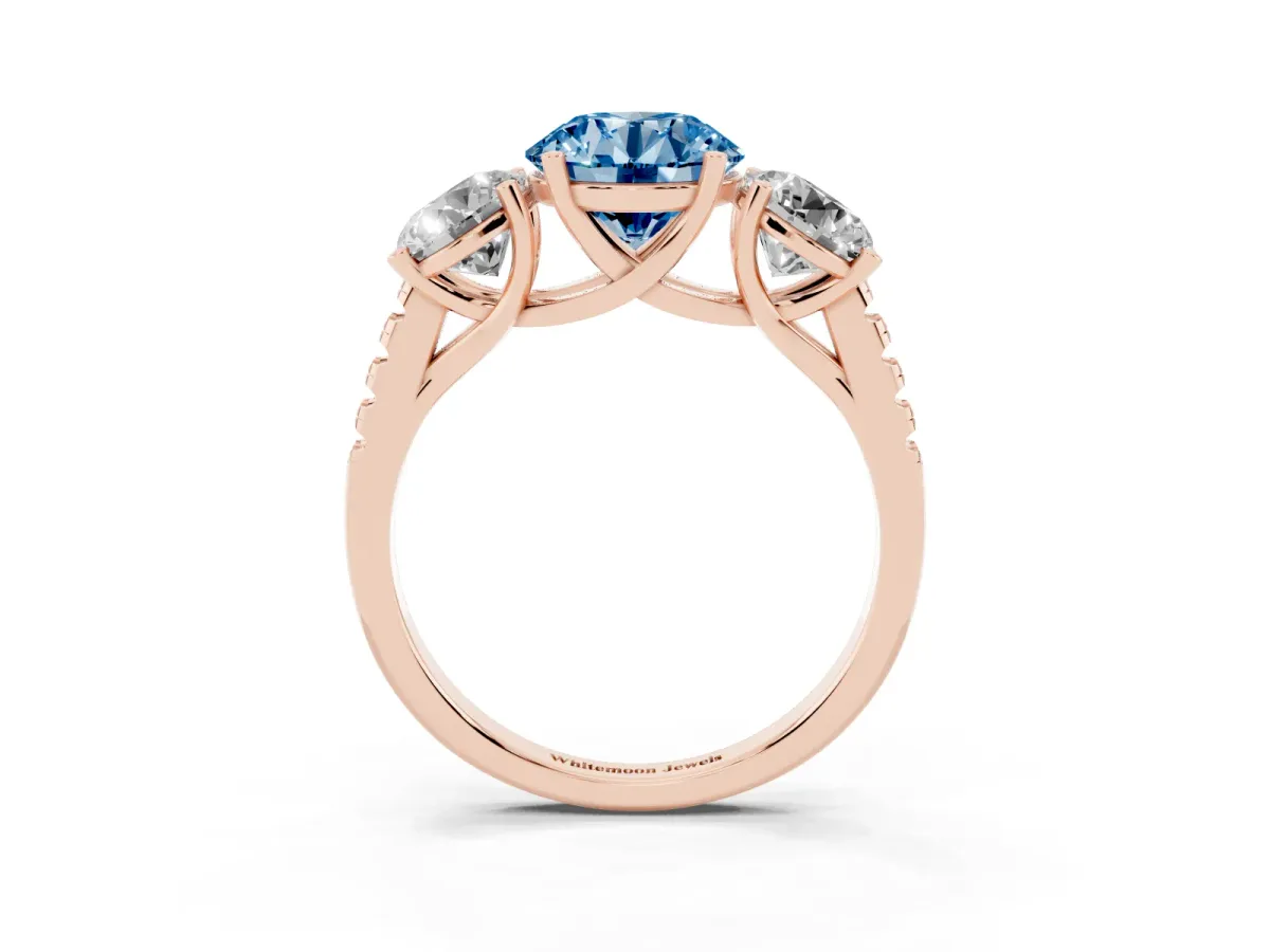 Fancy Blue Three-Stone Round Cut Diamond Ring with Round Pavé Band and Prong Setting Rose gold
