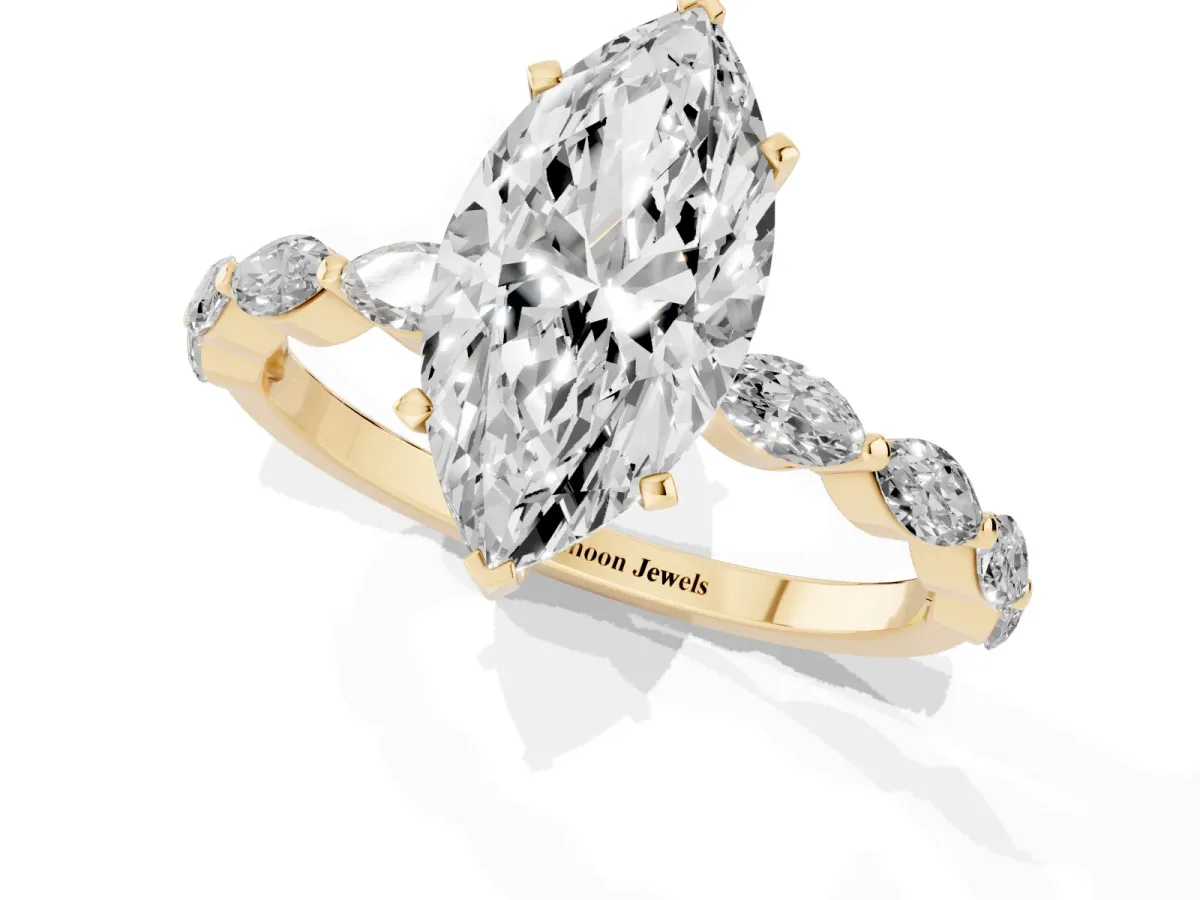 Marquise Cut Diamond Ring with Marquise Side Stones and Prong Setting Yellow gold